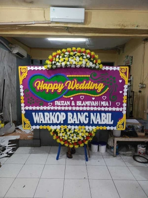 Papan Bunga di Teluk Naga